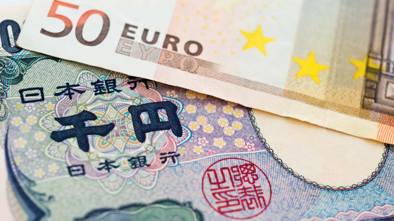 Close-up image of two currency banknotes: a €50 Euro note partially overlaying a ¥1000 Japanese Yen note, illustrating "How to Trade the EUR/JPY Currency Pair?"