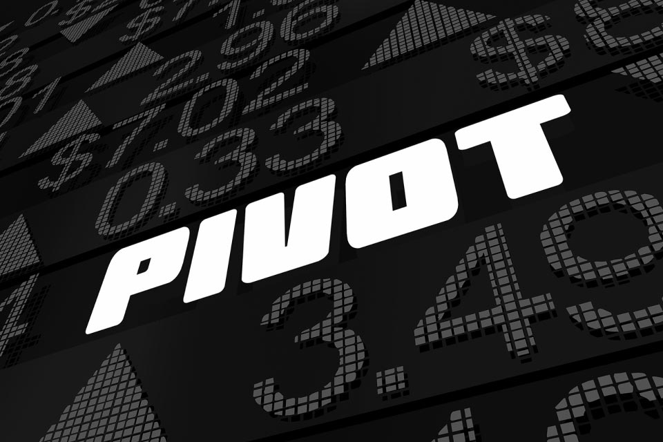 digital display featuring the word 'PIVOT' in bold text surrounded by numerical data