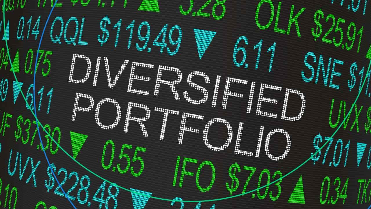 Digital stock ticker display featuring the phrase "DIVERSIFIED PORTFOLIO" in bold white text, illustrating "How to Build a Diversified Portfolio."