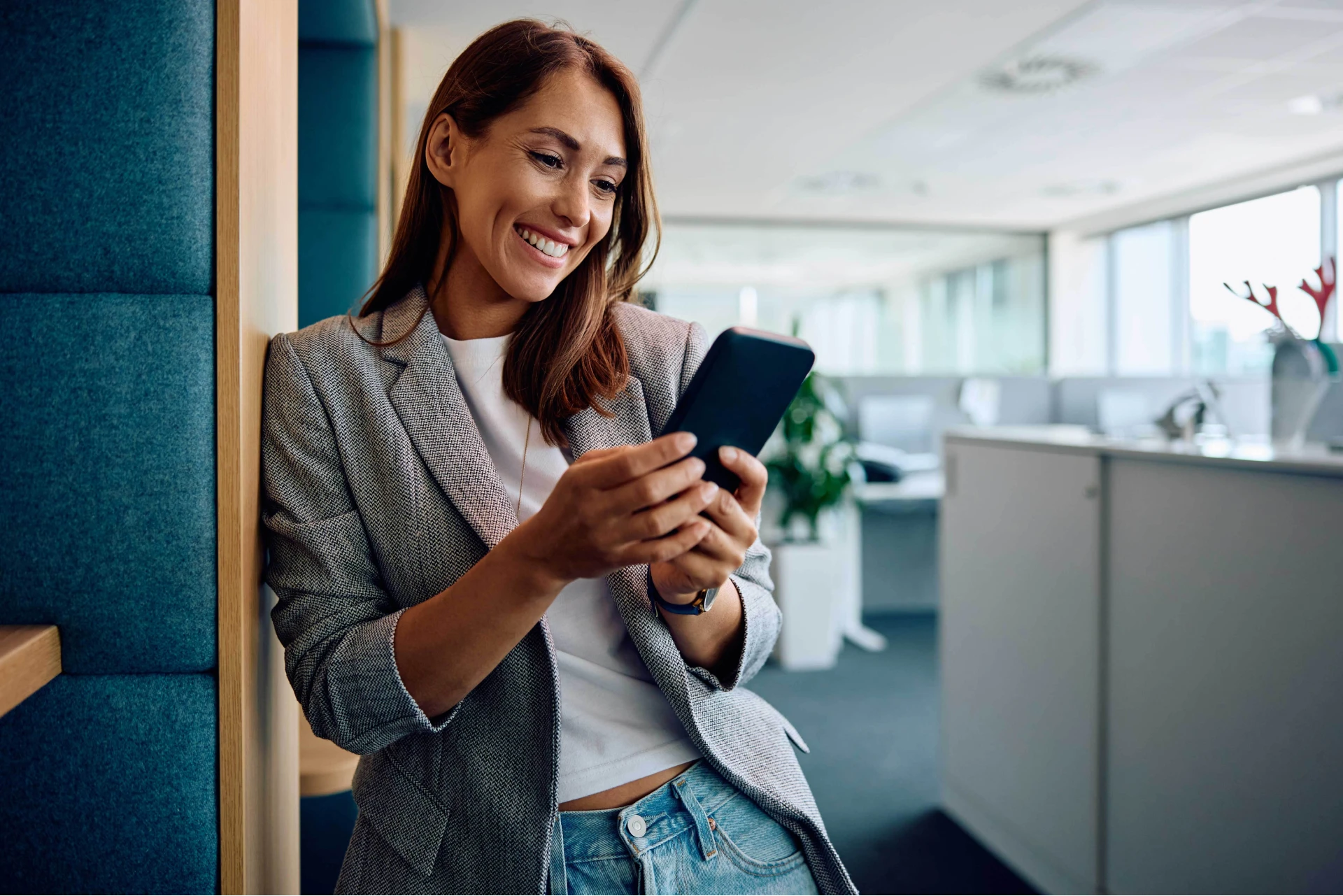 woman holding a mobile phone