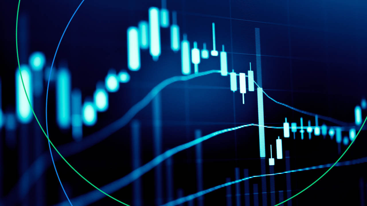 Blue-toned forex candlestick chart displaying price fluctuations within a defined range, illustrating market consolidation. What is a Ranging Market?