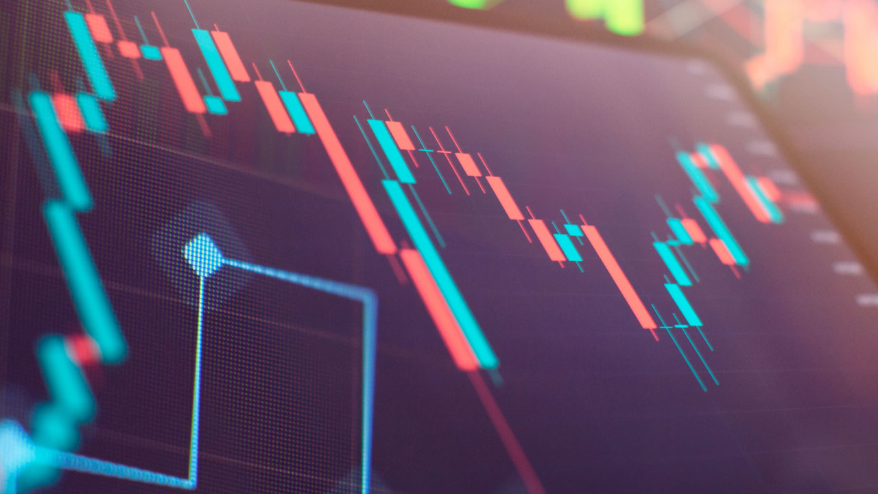 a financial trading chart displaying candlestick patterns and market trends