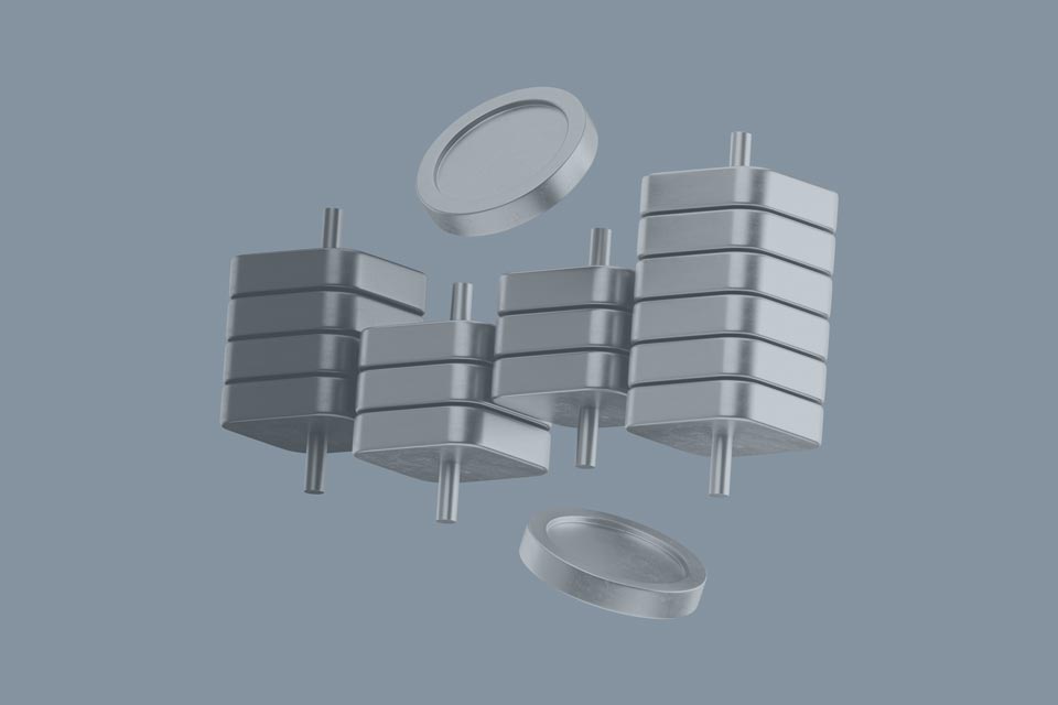 metallic coin stacks and weights representing financial balance 