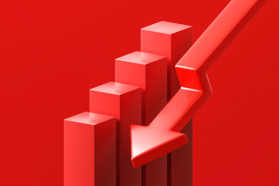 Is the US Recession Coming in 2025? — 3D red bar chart illustrating a sharp downward trend, with a large red arrow pointing down, symbolizing economic slowdown and recession concerns.