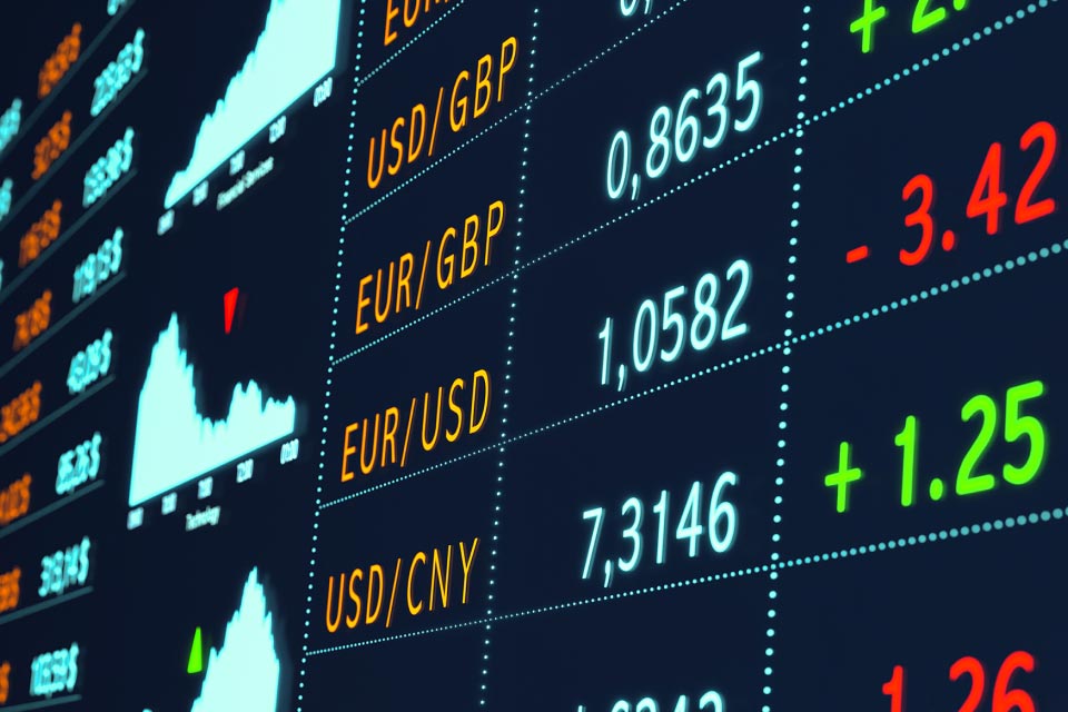 a digital forex trading board displaying various currency pairs 