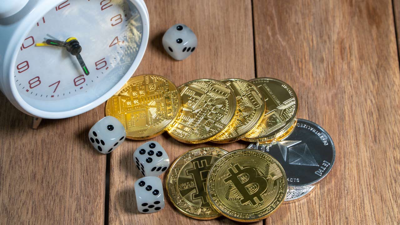 An image symbolizing cryptocurrency trading time frames, featuring a clock, Bitcoin and Ethereum coins, and dice, representing the strategic decision-making involved in selecting optimal time frames for crypto trading.