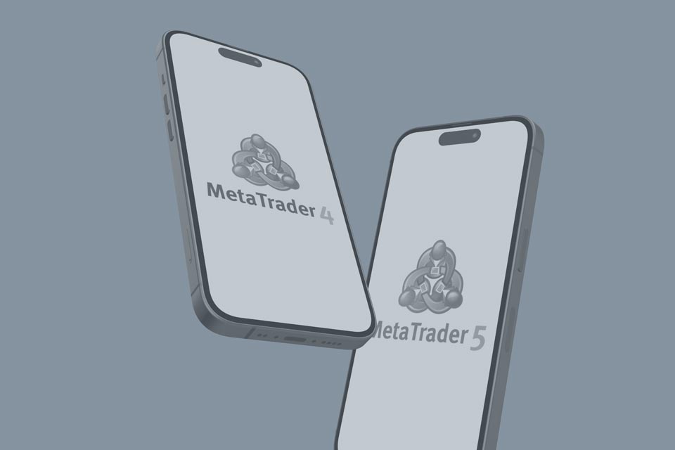 two smartphones displaying the MetaTrader 4 and MetaTrader 5 logos 