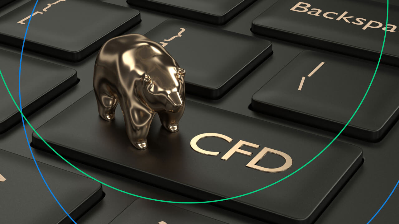 a keyboard with a golden bear figurine standing on a key labeled 'CFD'