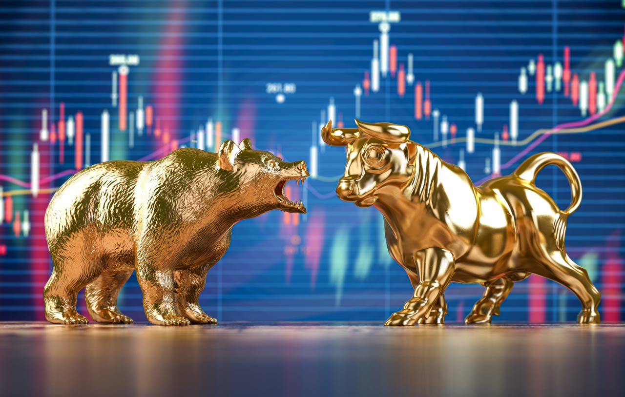 A golden bull and bear facing off against a background of a financial candlestick chart, symbolizing bullish and bearish market trends when trading the engulfing pattern.