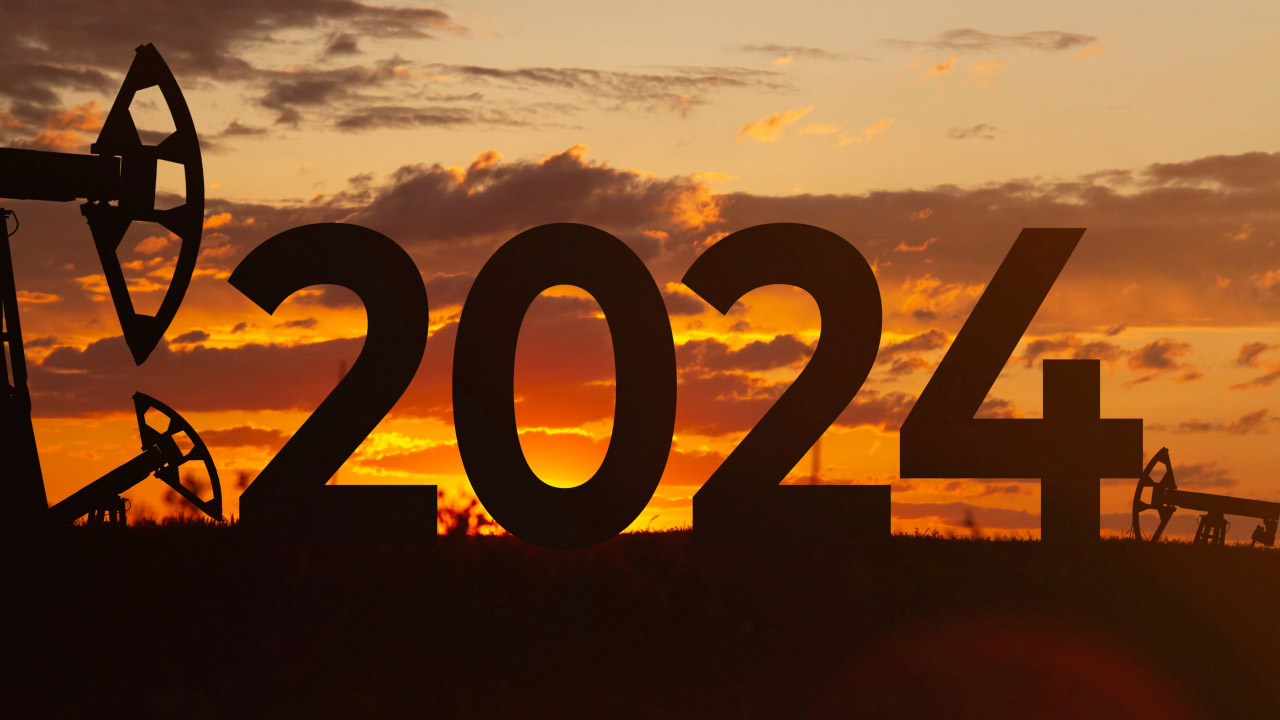 silhouette of large "2024" numbers is set against a sunset